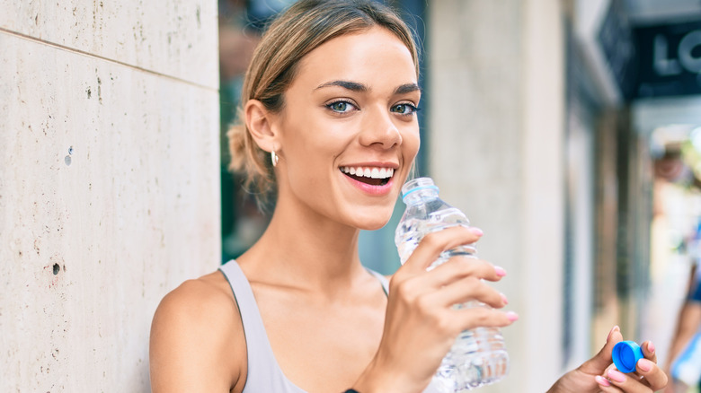 Shelves stocked with bottle of water