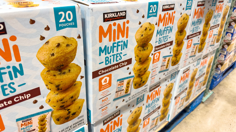 Boxes of Kirkland Signature mini muffin bites sit stacked on top of each other.