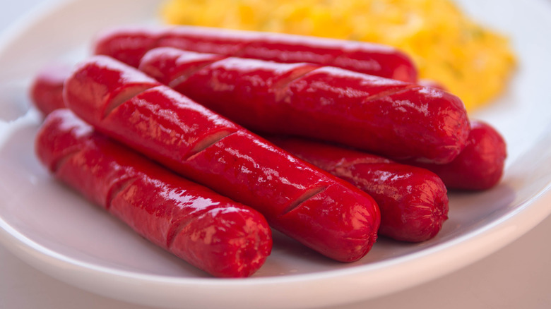 Plate of red hot dogs