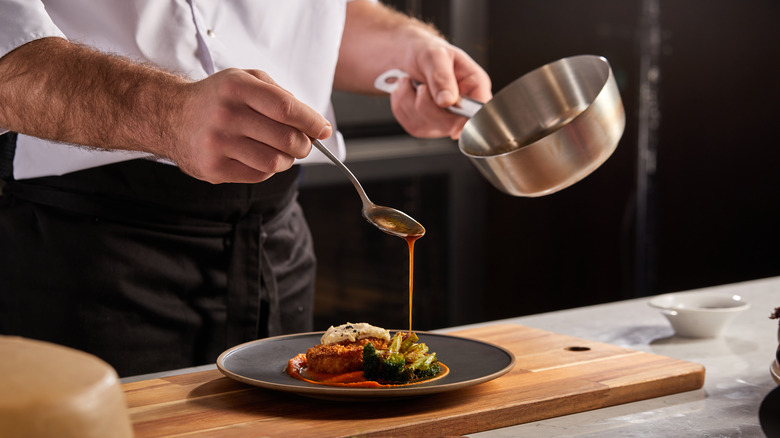 Chef preparing dish