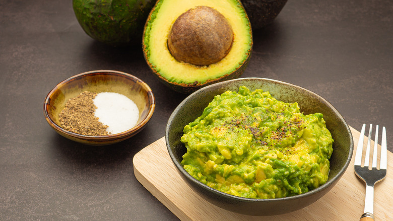 Guacamole fork and avocado 