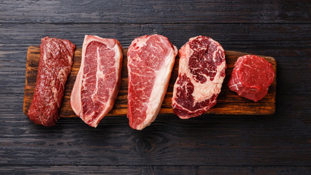 Steak cuts on a wooden board