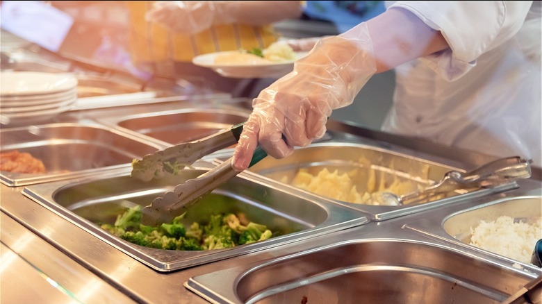 Serving school cafeteria lunch