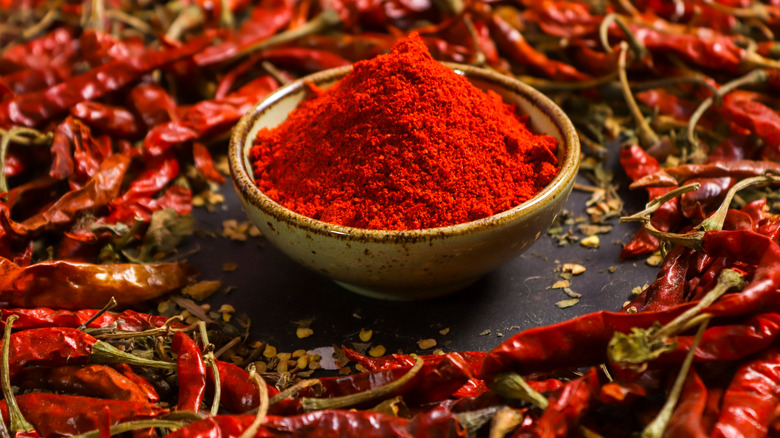 Cayenne pepper surrounded by chili
