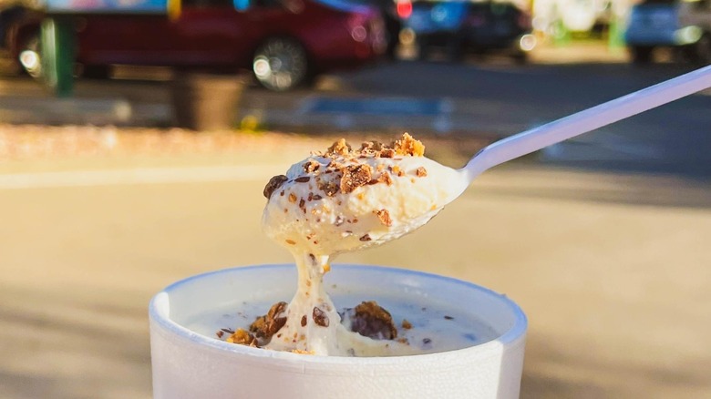 a spoon dipping out of ice cream at Sonic