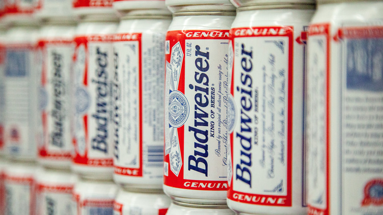 Budweiser cans on grocery shelf