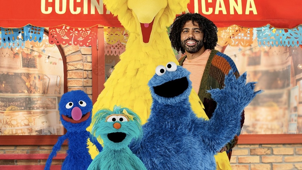 Grover, Rosita, Cookie Monster, Daveed Diggs, and part of Big Bird