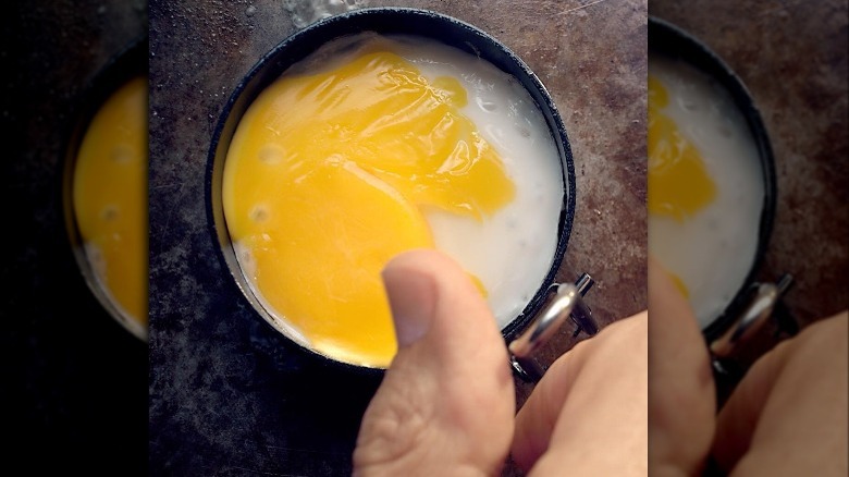 Egg cooking in McDonald's' egg ring