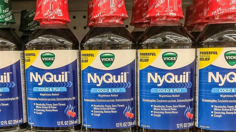 Row of NyQuil bottles