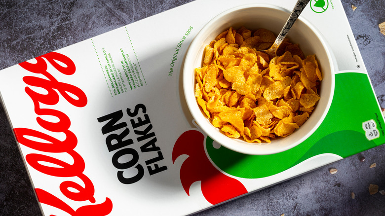 Bowl of Kellogg's cornflakes on cereal box