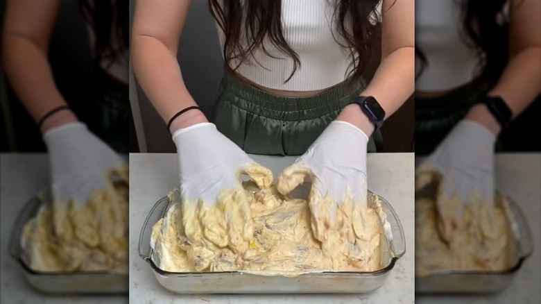 chicken marinade mixed with hands