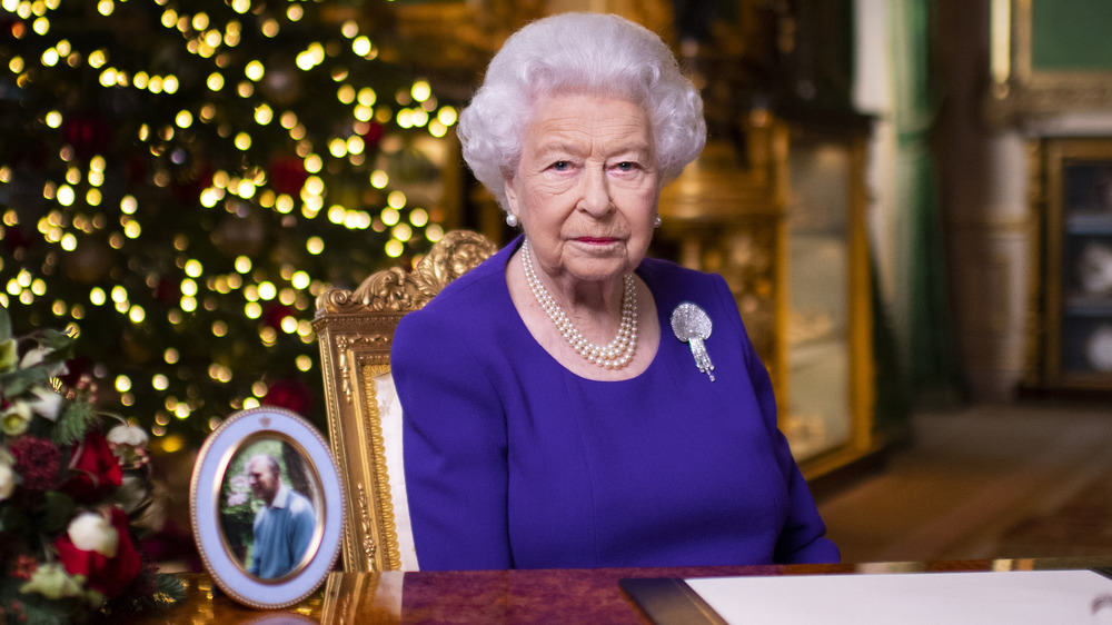 Queen Elizabeth in purple dress