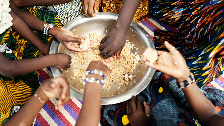 hands in a bowl