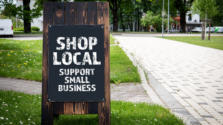 A support small business sign
