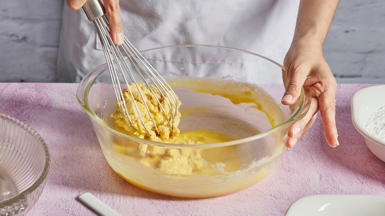 Person whisking batter