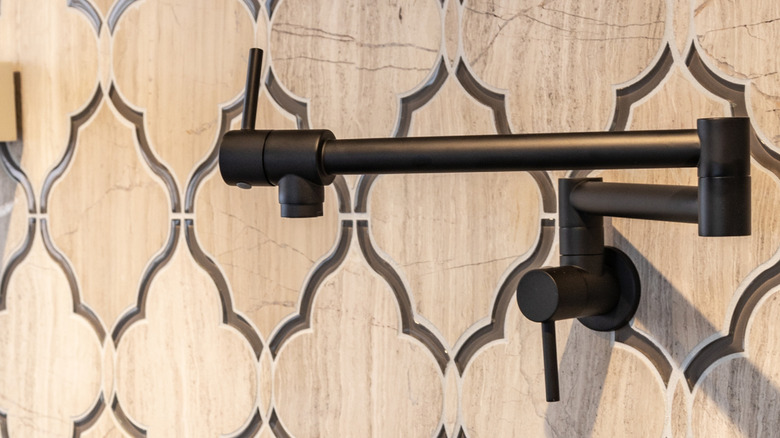 A pot filler on a wall