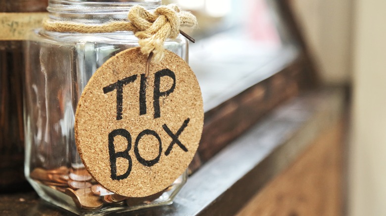 Glass tip jar