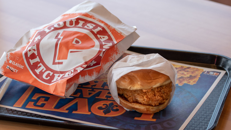 Popeyes chicken sandwich on tray