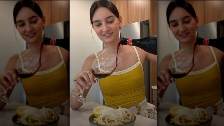 Emily Mariko pouring wine