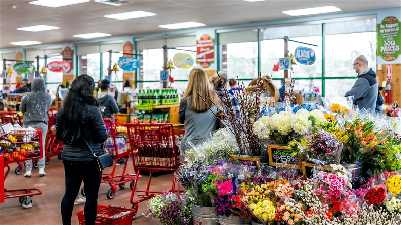 shoppers inside of Trader Joe's