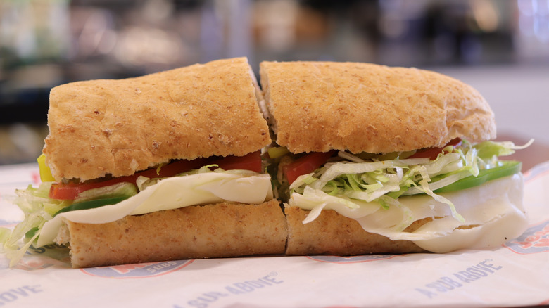 Cold submarine sandwich on top of Jersey Mike's paper wrapper.