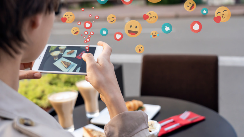Photographing food with multi-colored emojis