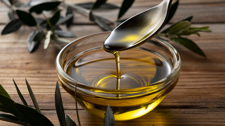 olive oil in spoon