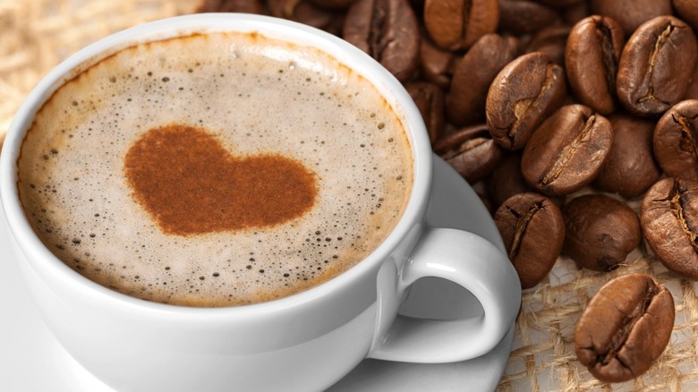 Cup of coffee with heart-shaped foam