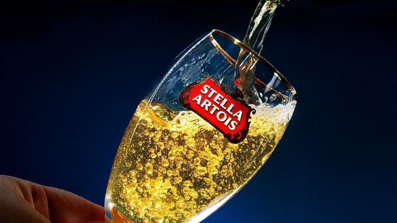 Beer entering Stella Artois glass