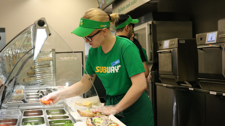 Subway employee at work
