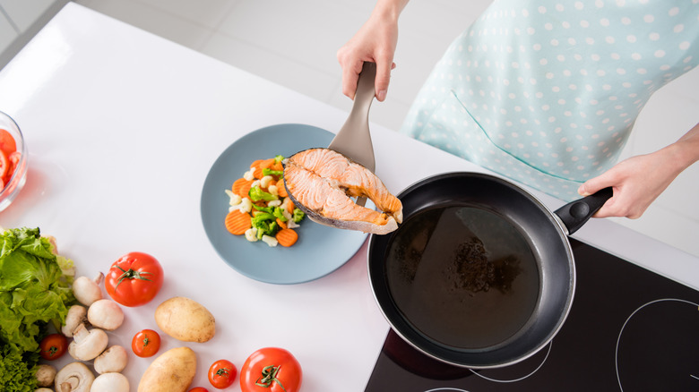 Pan searing a salmon fillet  