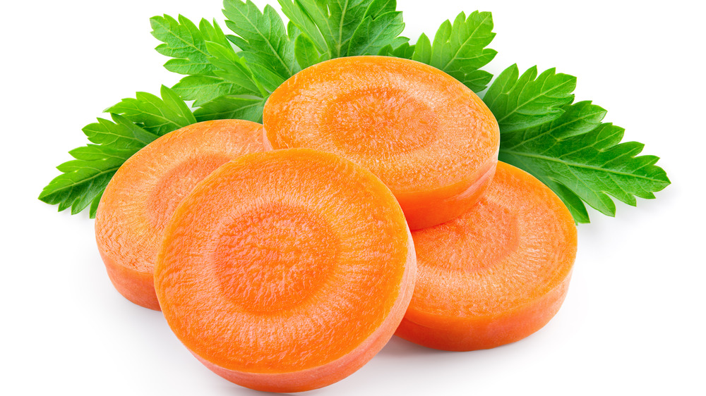 Stacked carrot slices with parsley
