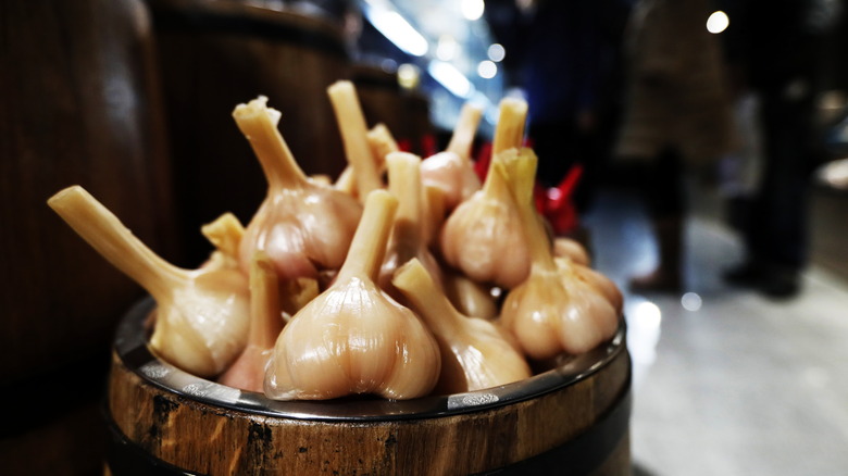 Pickled garlic in barrel