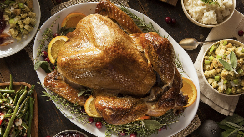 Whole roasted turkey on platter
