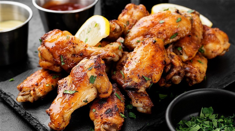 Chicken wings on a slate board