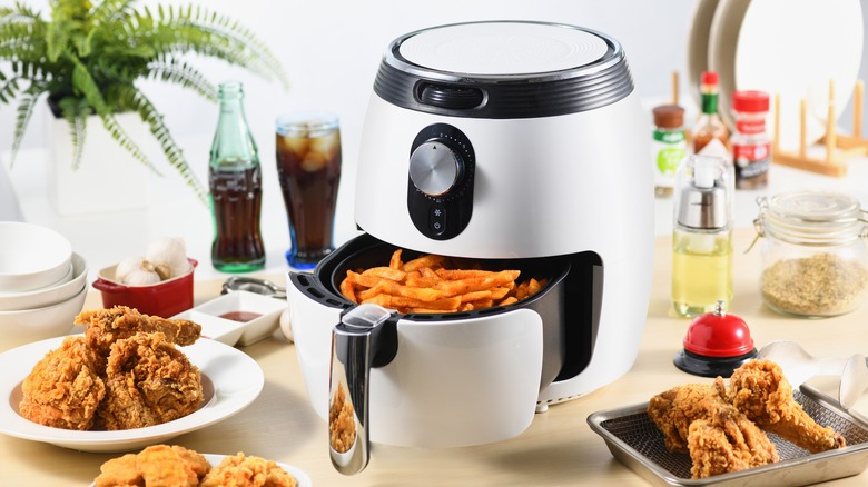 white air fryer with food