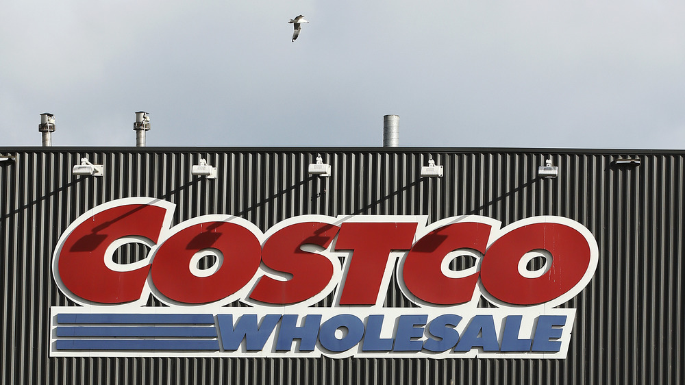 Seagull you fly across the horizon, over the Costco sign. Nobody knows where you are going. Nobody knows if Costco's chickens are fine.