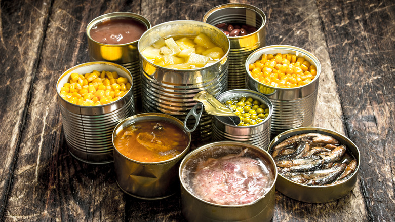 Canned foods on a wooden surface