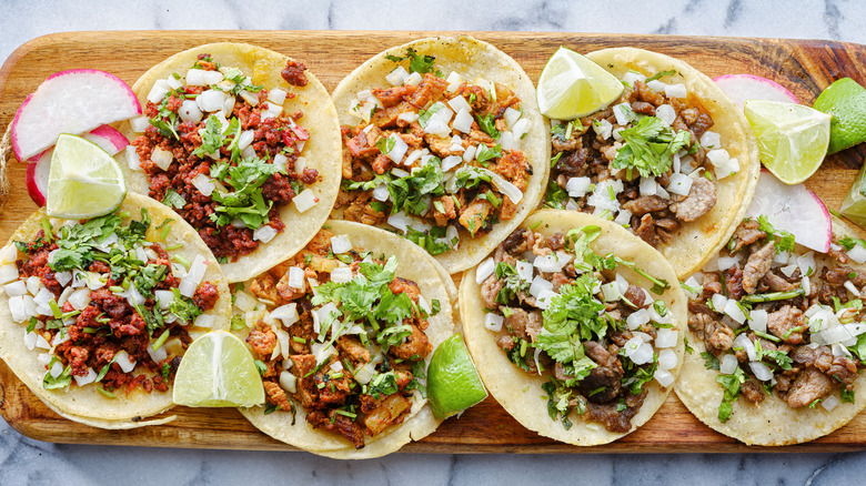 tacos on wooden board