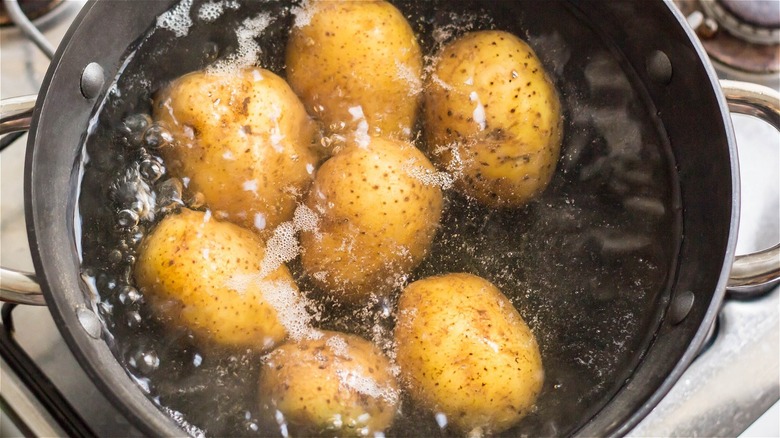 Potatoes boiling in a pot