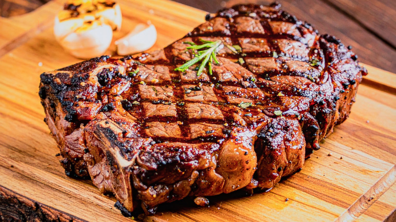 Seared steak on cutting board