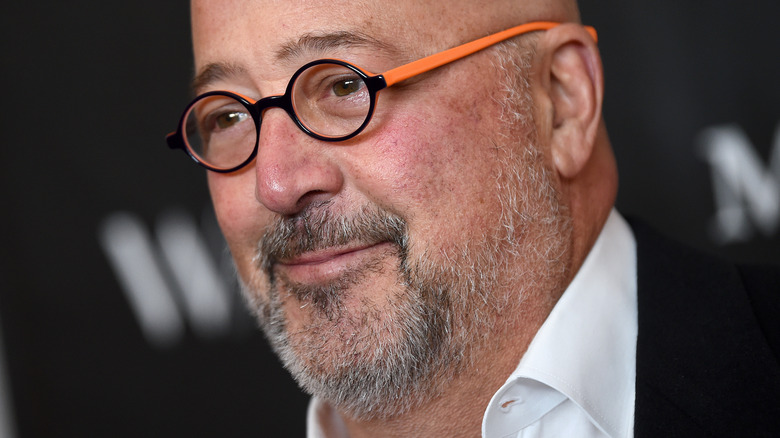 Andrew Zimmern wearing glasses