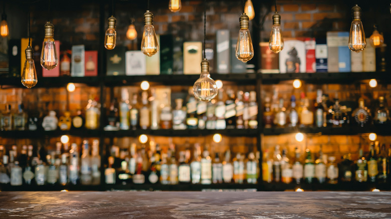 Bottles of liquor behind a bar