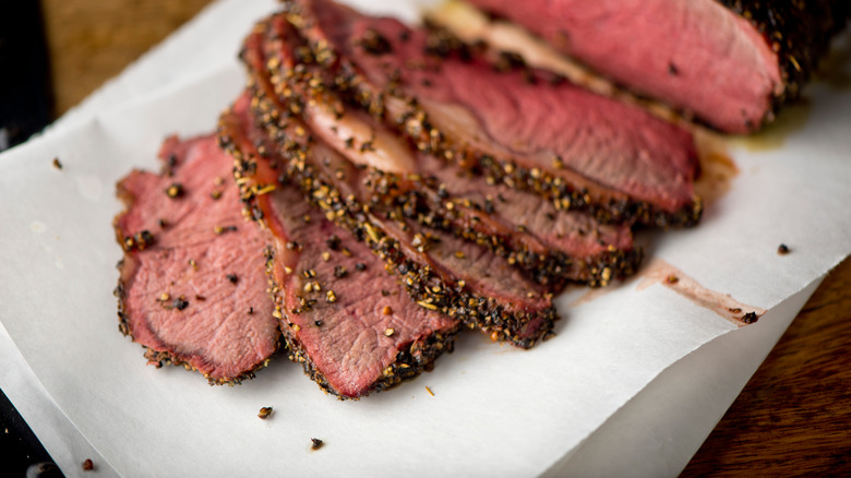 Beef prime rib barbecue rubbed in spices and seasoning, ready to serve.