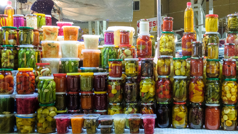 Jars of various types of pickled vegetables.