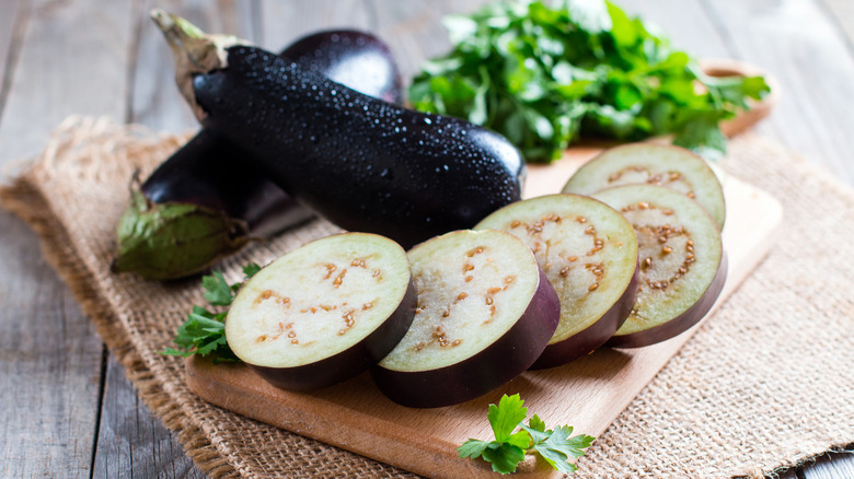 Eggplants on cutting board