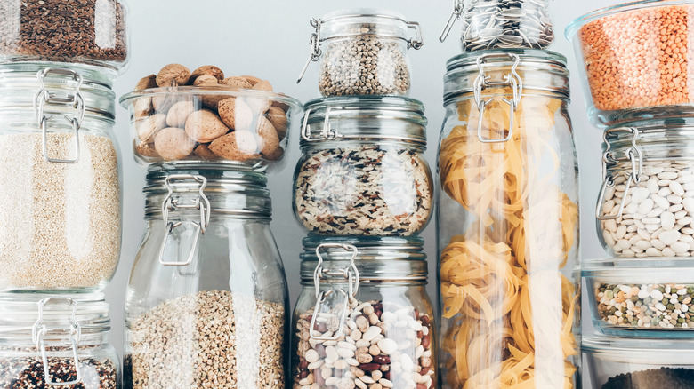 Pasta, beans, and grains in glass jars