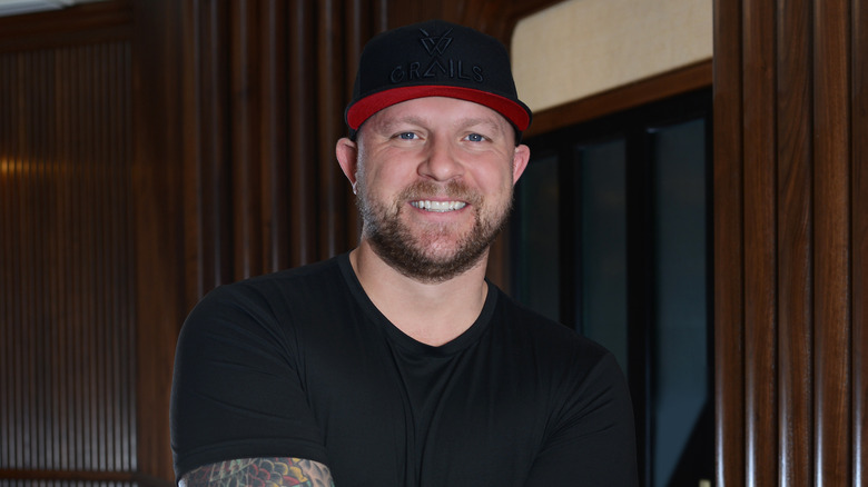 Jeremy Ford smiling and standing