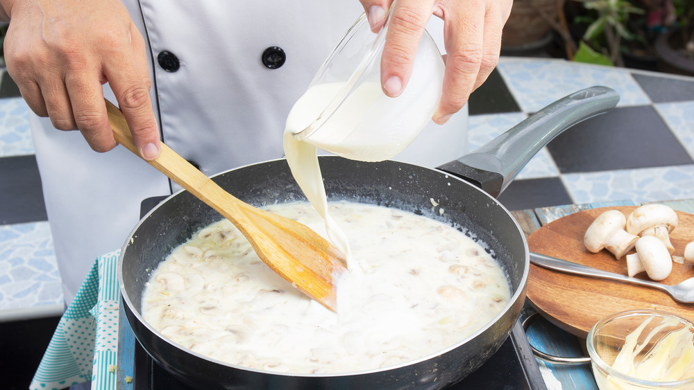 Chef making cream of mushroom soup
