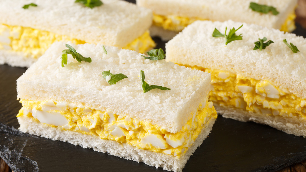 Egg salad sandwiches on plate